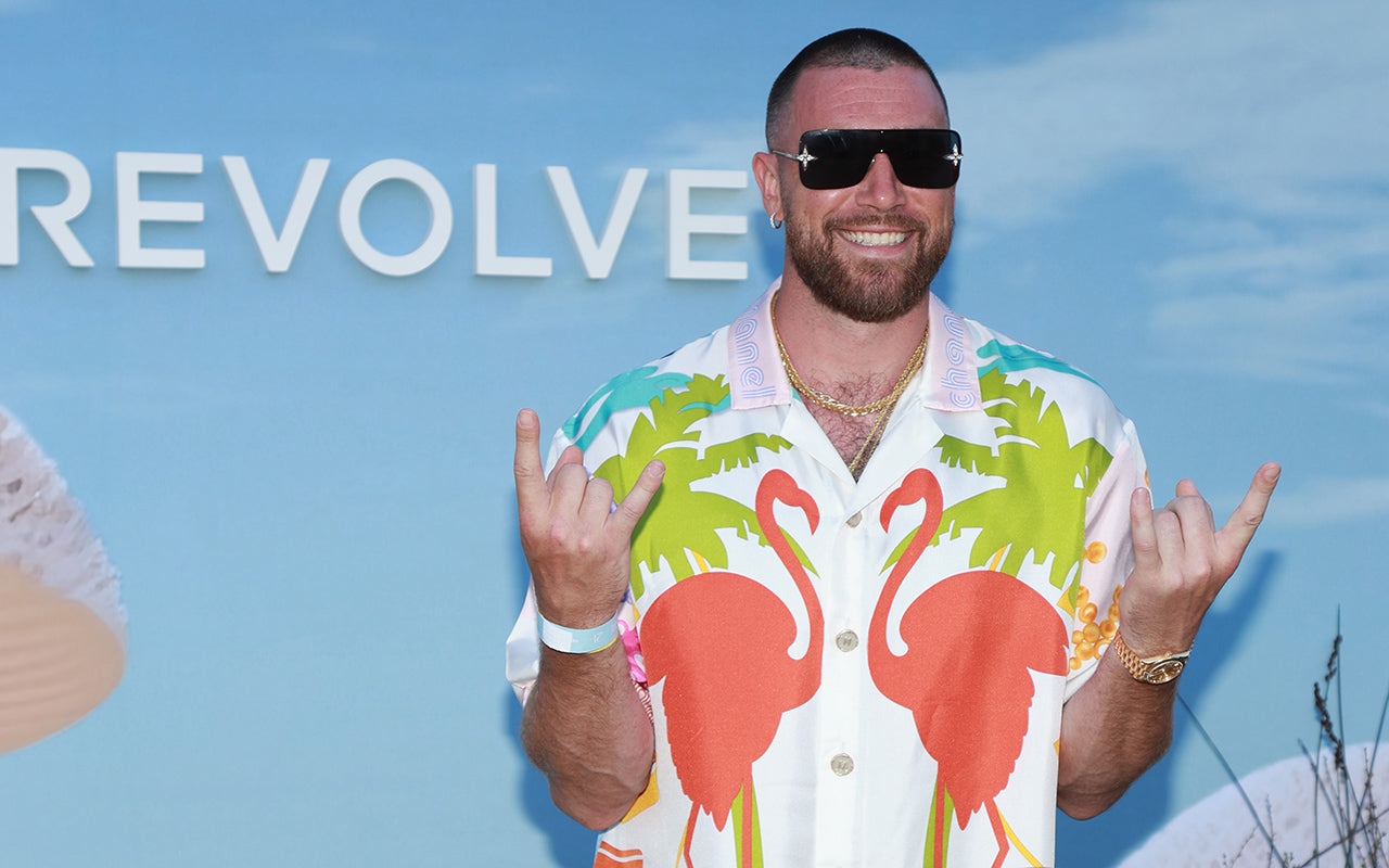 Travis Kelce in the flamingo-print J. Logan Home Maison shirt at Revolve Festival